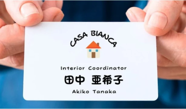 カラフルな家のイラストを使ったCASA BIANCA名刺